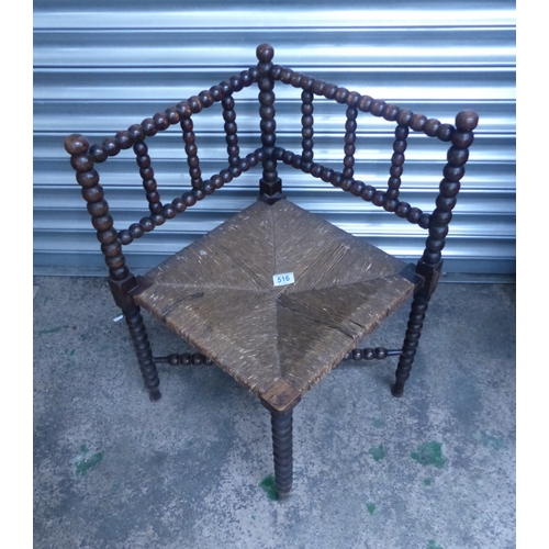 516 - Late victorian arts and crafts Turned Bobbin Oak Rush Seated corner chair circa 1890 (68cm H)