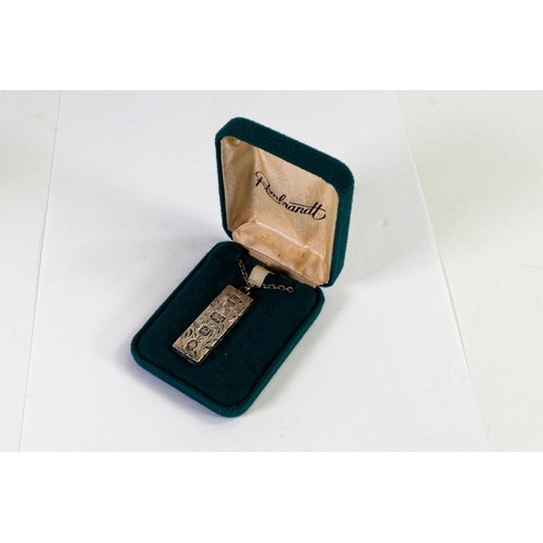 757 - Silver hallmarked ingot and silver chain, gross weight 39.26g.