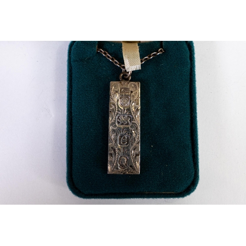 757 - Silver hallmarked ingot and silver chain, gross weight 39.26g.