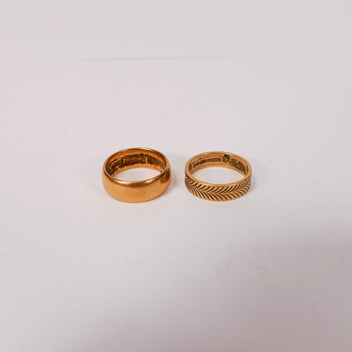 743 - Two gold wedding bands, 22ct weighing 7.74g, together with 9ct 2.69g. (2)