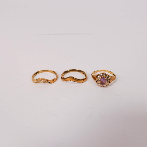 744 - Three x 9ct gold dress rings, two wishbone shaped (one gem set), the other set purple & white stones... 