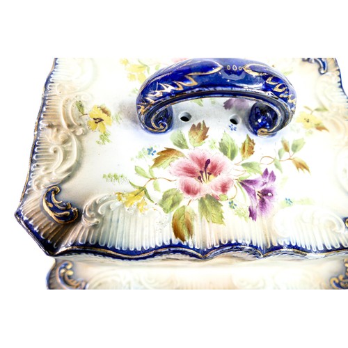 163 - Carlton Blush ware cheese dish & cover with petunia floral highlighted with blue border decoration, ... 