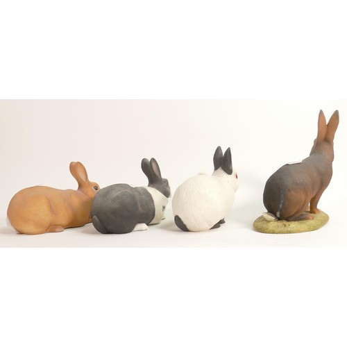 374 - North Light large resin figures of four rabbits, height 17cm. These were removed from the archives o... 