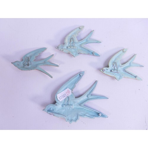 410 - Wade unmarked Flight of Swallows metal wall plaques, length of largest 11cm, some paint crazing. The... 