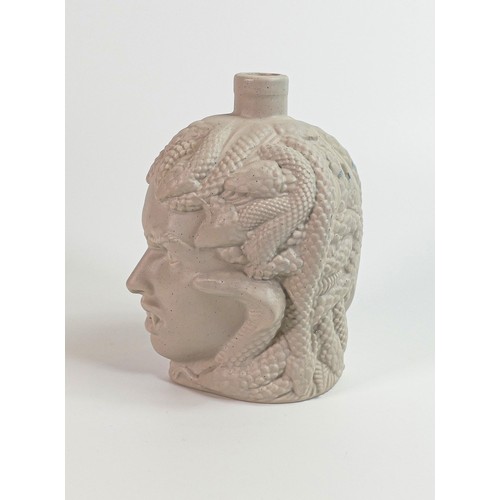 416 - Bisque unglazed Stone Glaze Sour Berry Rum decanter in the form of Medusa bust, height 16cm.