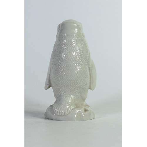 426 - Wade white glazed figure of a penguin. Unmarked to base, height 12.5cm. These items were removed fro... 