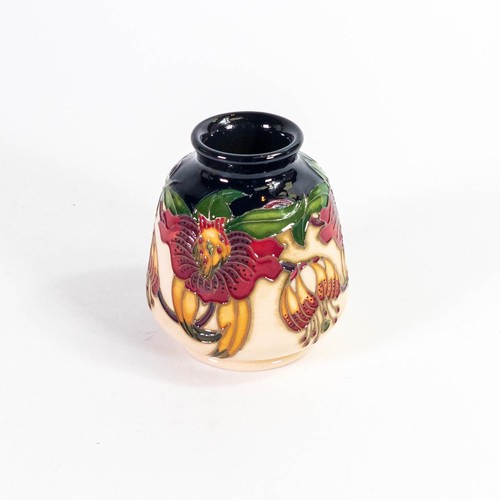 540 - Moorcroft Anna Lily vase. Designed by Nicola Slaney, height 7.5cm