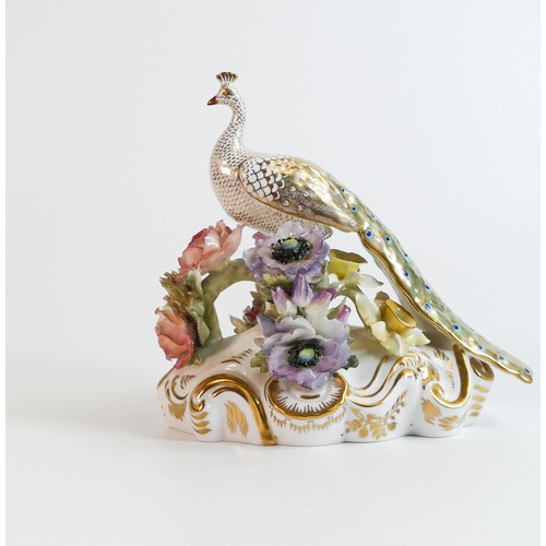 588 - Royal Crown Derby boxed peacock figure, height 18cm