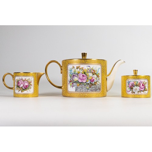 602 - Lynton Fine Porcelain tea set comprising tea pot, covered sugar and milk jug, gilded on yellow groun... 