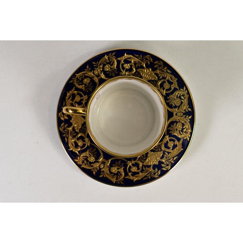 603 - Lynton Fine Porcelain coffee can & saucer, gilded on blue ground, hand painted with galleon & ships ... 