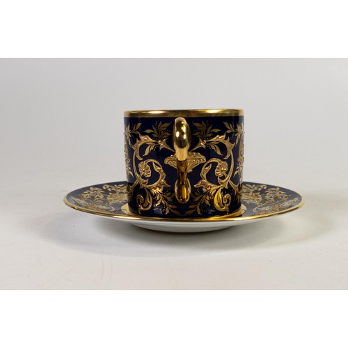 604 - Lynton Fine Porcelain coffee can & saucer, gilded on blue ground, hand painted with flowers by Stefa... 