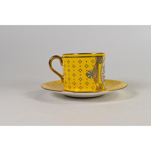 605 - Lynton Fine Porcelain coffee can & saucer, gilded on yellow ground, hand painted with flowers by Ste... 