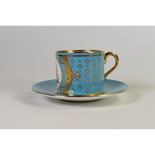 606 - Lynton Fine Porcelain coffee can & saucer, gilded on light blue ground, hand painted with flowers by... 