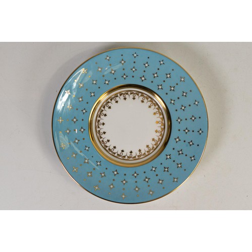 606 - Lynton Fine Porcelain coffee can & saucer, gilded on light blue ground, hand painted with flowers by... 