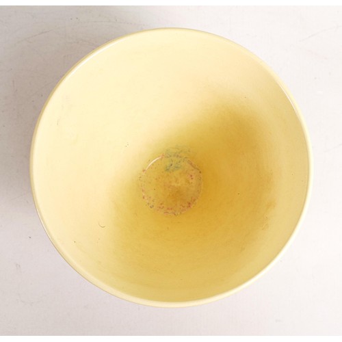 624 - Wedgwood Keith Murray ribbed yellow vase, height 14cm (a/f) production fault to rime of base.