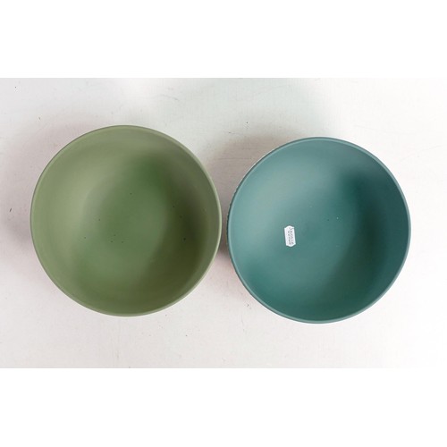 629 - Two Wedgwood Jasper ware fruit bowls, one in Teal green and the other Sage green. Measure 20cm in di... 