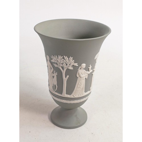 640 - A Wedgwood Jasper ware neo classical Arcadian vase, in grey. Measures 19 cm in height.