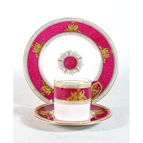 653 - Wedgwood pink & gilt decorated coffee can trio (3)