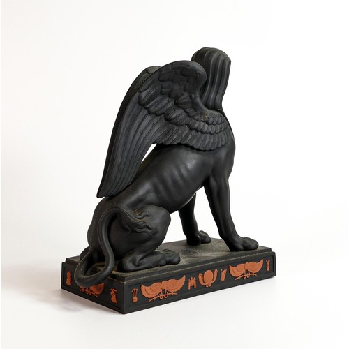 666 - Wedgwood black Basalt model of a Sphinx with terracotta Egyptian designs, dated 1973, h.22.5cm.