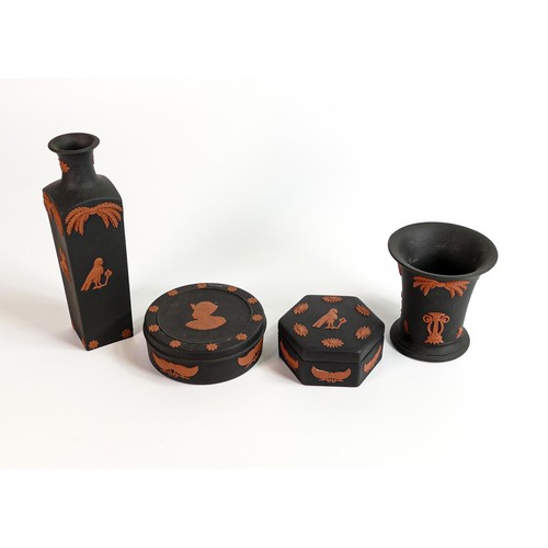 668 - A collection of Wedgwood black Basalt & terracotta Egyptian design small items. (4)