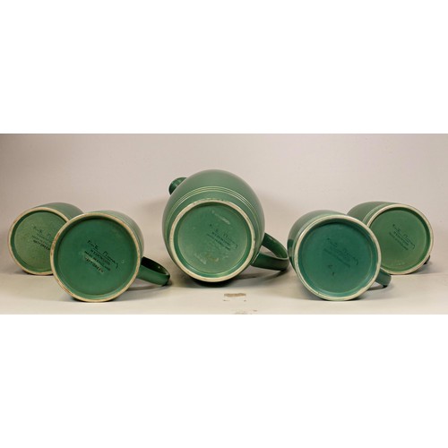 669 - Wedgwood Keith Murray water jug & tankards in matt green glaze, 1 tankard nibbles to base rim, heigh... 