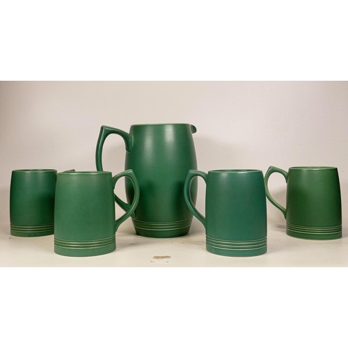 669 - Wedgwood Keith Murray water jug & tankards in matt green glaze, 1 tankard nibbles to base rim, heigh... 