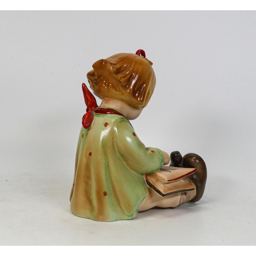 696 - Beswick Hummel large figure of seated girl reading book, model 904, height 15cm.