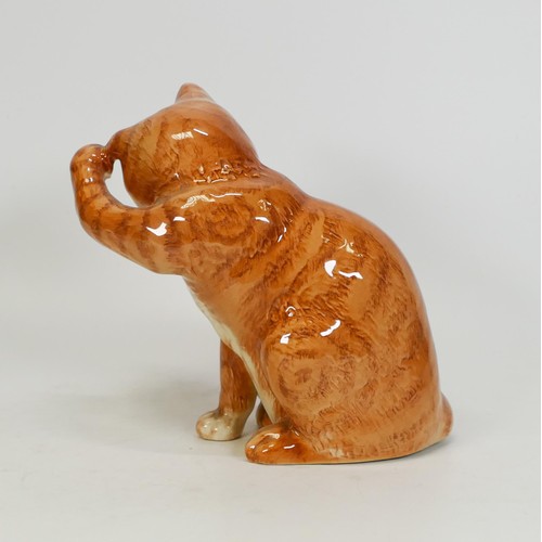 738 - Beswick cat scratching it's ear 1877 in ginger Swiss roll colourway.