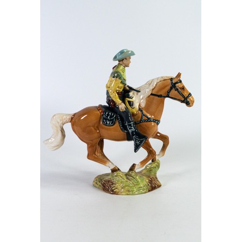 843 - Beswick Cowboy on galloping Palomino horse 1377