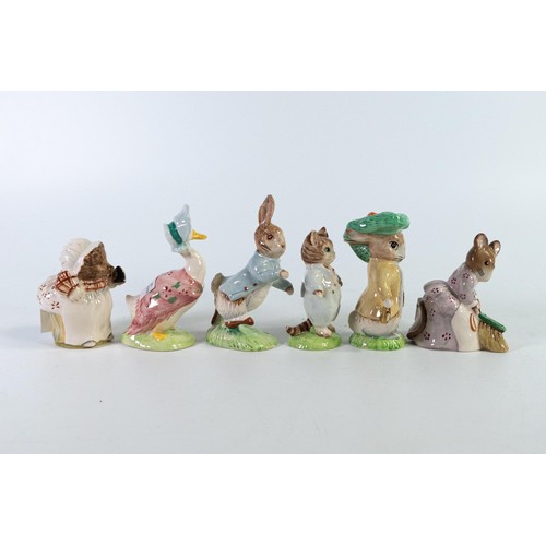 872 - Beswick Beatrix Potter BP9b figures with gold highlights to include Peter Rabbit, Hunca Munca Sweepi... 