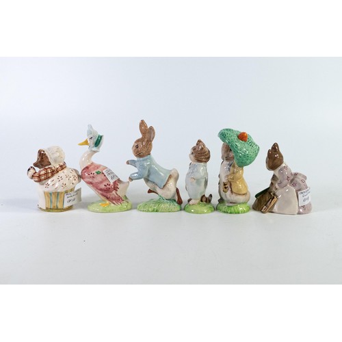 872 - Beswick Beatrix Potter BP9b figures with gold highlights to include Peter Rabbit, Hunca Munca Sweepi... 