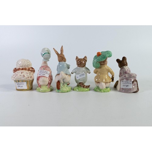 872 - Beswick Beatrix Potter BP9b figures with gold highlights to include Peter Rabbit, Hunca Munca Sweepi... 