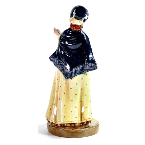 937 - Royal Doulton prototype character figure of a Victorian Street Seller, property of Royal Doulton not... 