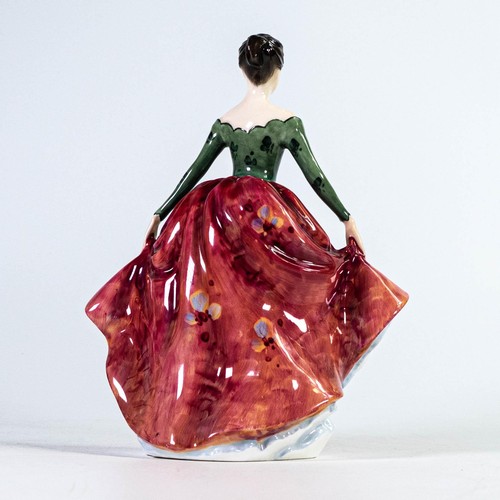 1026 - Royal Doulton prototype figure of lady holding the pleats of her dress, decorated in floral red and ... 