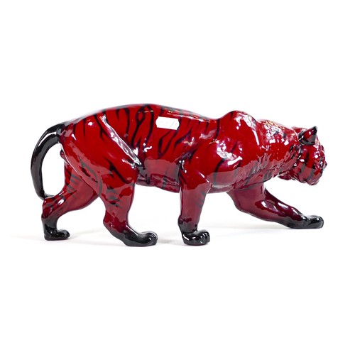 1064 - Royal Doulton large Flambe tiger. A few tiny scuffs in glaze to front leg.