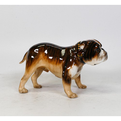 1080 - Royal Doulton Bulldog HN1047 in brown and black tones, height 9cm.