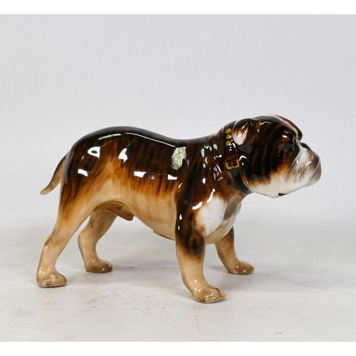 1080 - Royal Doulton Bulldog HN1047 in brown and black tones, height 9cm.