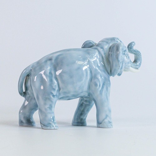 1093 - Royal Doulton figure of an elephant with trunk in salute HN891B in an unrecorded grey colourway, hei... 