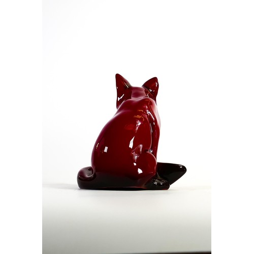 1094 - Royal Doulton Flambe model of a seated fox, rarer medium version, h.15cm.