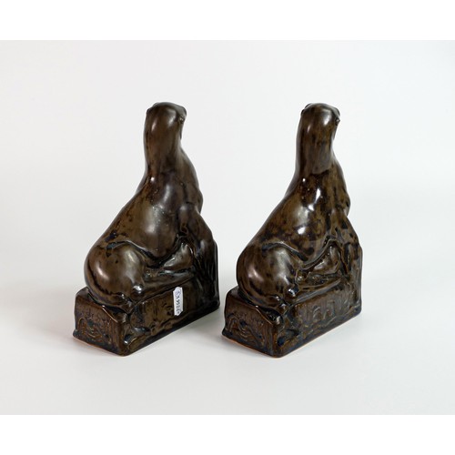 1127 - Royal Doulton 1920s pair of Stoneware models of a Sealion on a glacier by Richard Garbe, height 21cm... 