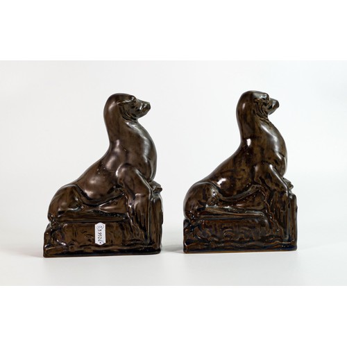 1127 - Royal Doulton 1920s pair of Stoneware models of a Sealion on a glacier by Richard Garbe, height 21cm... 