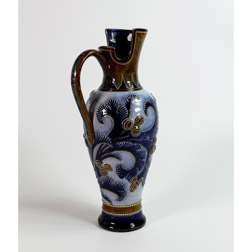 1131 - Doulton Lambeth Stoneware ewer decorated with scrolling foliage and flower heads in two tone blue & ... 