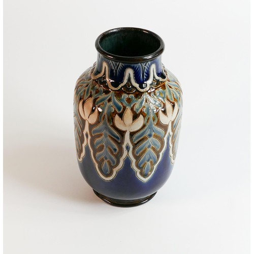 1185 - Doulton Lambeth Stoneware vase decorated with stylised foliage by Frank Arthur Butler, h.21.5cm. Som... 