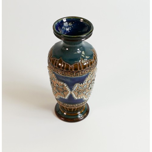 1188 - Doulton Lambeth Stoneware vase decorated with panels of flowers, c1885, h.16.5cm.