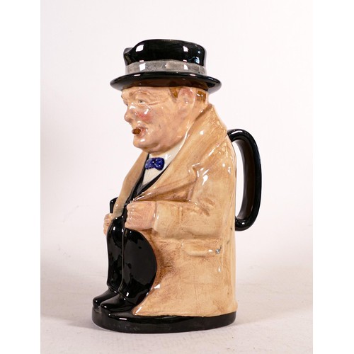 1307 - Royal Doulton large toby jug Winston Churchill in unusual light tan suit, h.23cm.