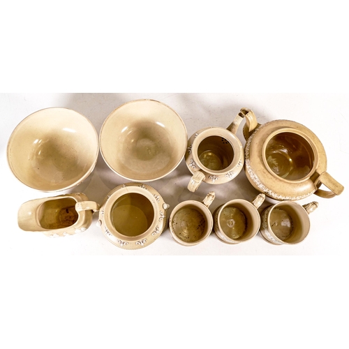 1438 - A large collection of 19th century sprigged ware including teapots, mugs, cream jug etc. (9)