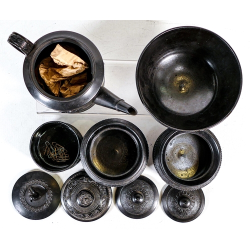 1439 - A collection of 19th century black Staffordshire ware including teapot, lidded pots bowl etc. (5)