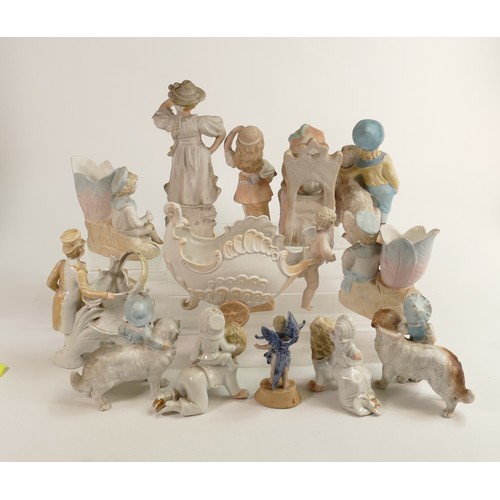 1482 - Collection of thirteen German bisque figures including children with dogs, Putti chariot etc.