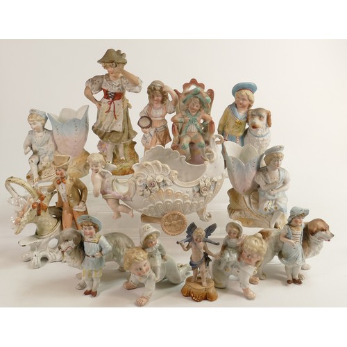 1482 - Collection of thirteen German bisque figures including children with dogs, Putti chariot etc.