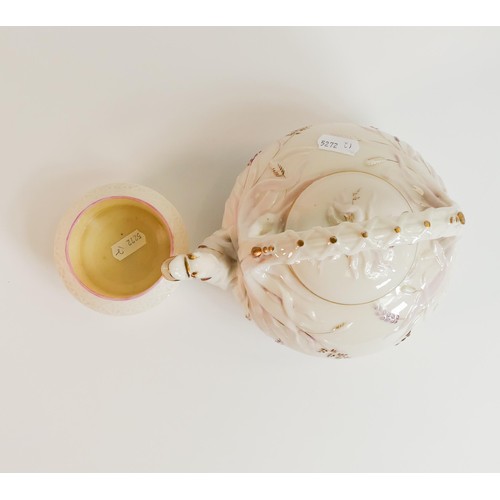 1485 - Belleek porcelain duck tea pot in shades of pink and gold, h.17cm together with Belleek sugar bowl. ... 